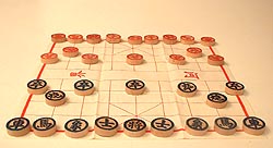 a typical xiangqi (Chinese chess) set, ready to play